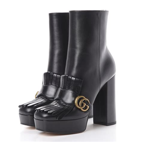 gucci marmont fringe boots.